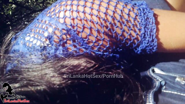 Sri Lankan babe in blue fishnet top, outdoor risky handjob tease