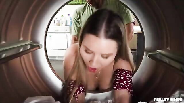Busty young blonde gets anally fucked in laundry room dryer