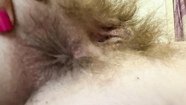 Closeup of tight wet hairy pussy on 18yo girl spreading legs