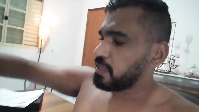 Arabian bearded man shirtless showing muscular body in solo amateur video