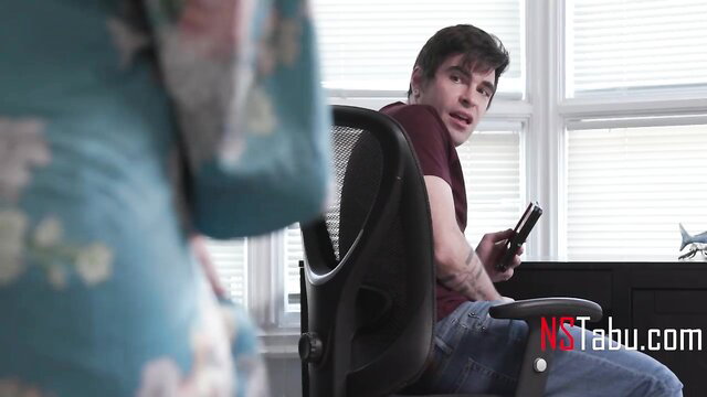 Step mommy sneaks up on guy masturbating in office chair HD video