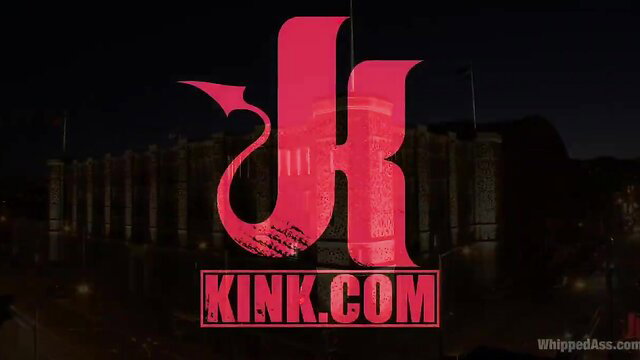 Kink.com logo on dark background with red devil K emblem