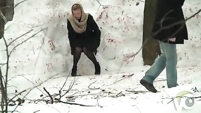 Russian maid caught peeing in snow, squatting with exposed ass outdoors
