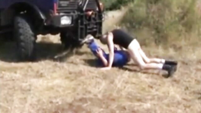 Nude trucker masturbating outdoors by Jeep in field