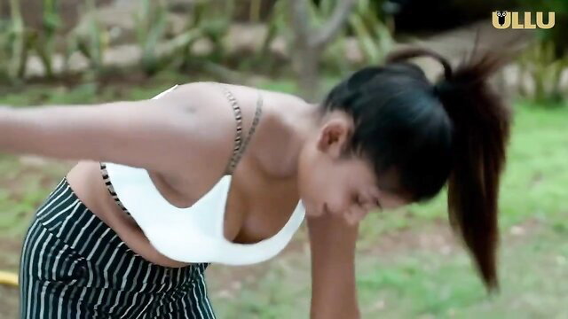 Indian babe in white bra and striped pants bending over in hot Ullu series