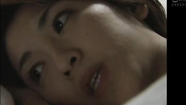 Closeup of hot Asian mature amateur in stockings, seductive gaze