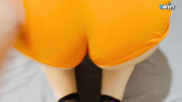 Orange shorts closeup on big thick ass, pale thighs, POV tease