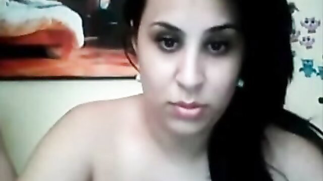 Desi busty MILF closeup with huge tits and sultry gaze