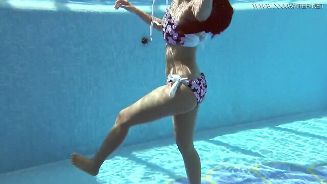 Andreina De Luxe wet bikini tease in erotic underwater pool show