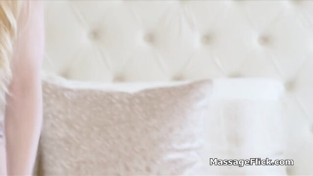 Busty blonde gets deep fingering in erotic massage