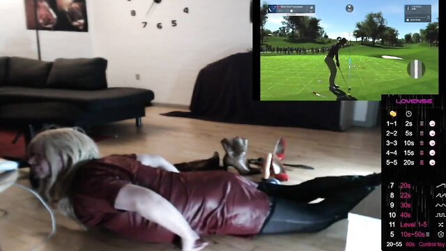 Wicki von Trannyston in leather top and leggings does pushups with LUSH toy