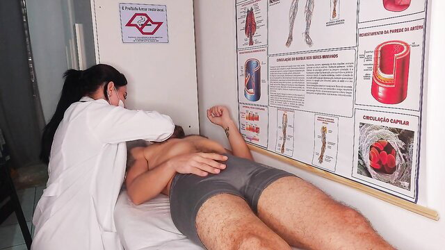 Hot nurse grabs patient's bulging cock in exam room mishap