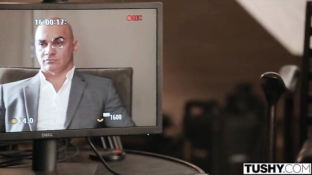 Chanel Shortcake watches TV in office on Tushy DP thumbnail