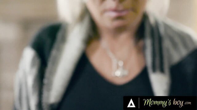 Payton Hall mature blonde in scarf smirks seductively