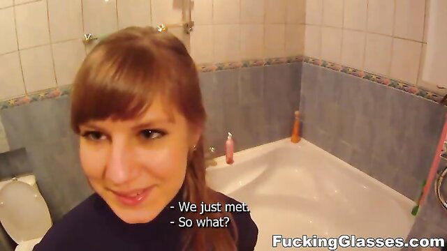 Redhead tutor in bathroom smiles seductively after just meeting