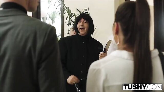 Abigail Mac in Tushy anal scene, long ponytail, office suit tease