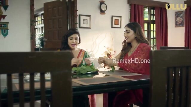 Two sexy Indian MILFs in sarees at dinner table erotic scene