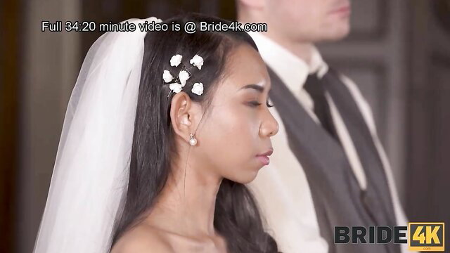 Killa Raketa in wedding veil and dress, elegant bride pose for Orgy Wedding