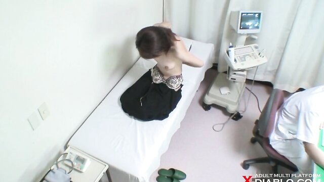 23yo Japanese piano teacher topless in gyno exam on table