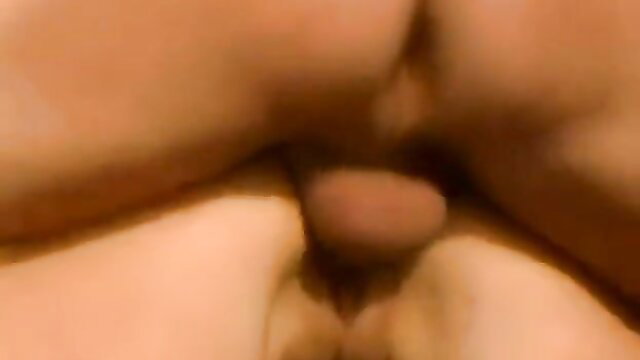 Closeup of woman spreading pussy lips exposing pink vagina and clit