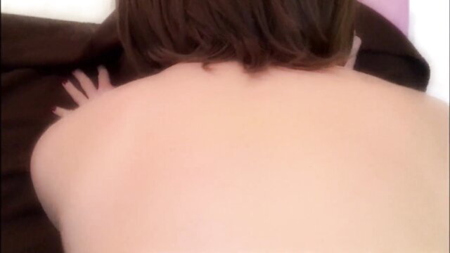 Nude Asian woman with bob haircut kneeling naked from behind