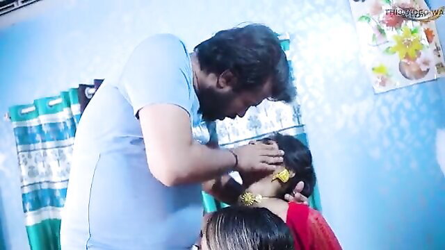 Indian groom intimately touching daughter-in-law's neck and jewelry