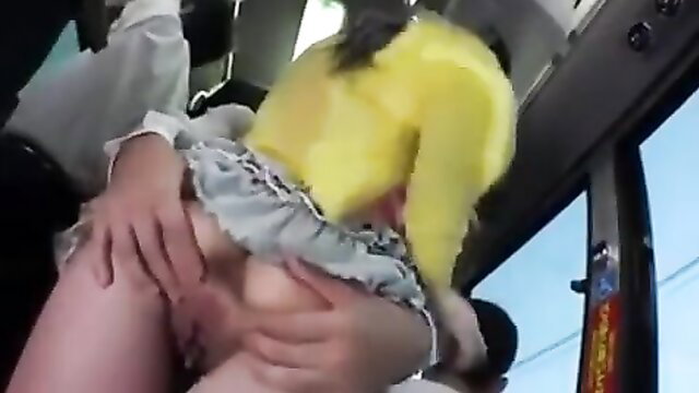 Busty Japanese teen groped under skirt on crowded city bus