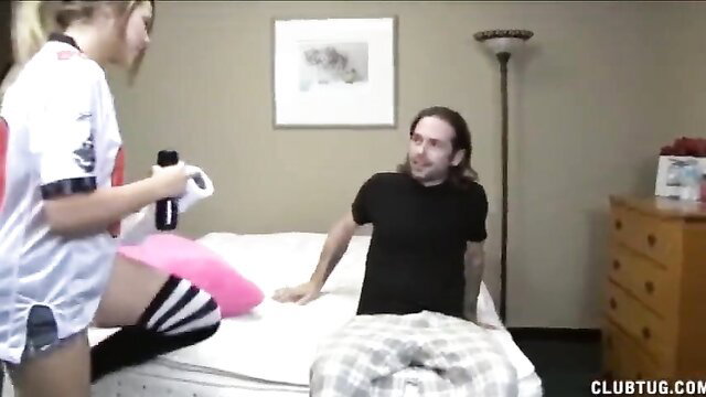 Cute teen in cheerleader outfit and stockings teases guy on bed