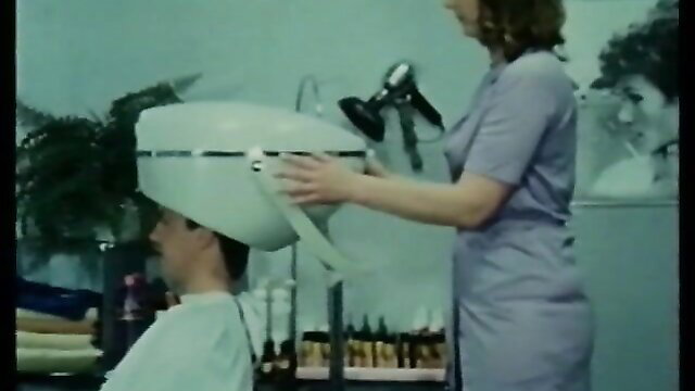 Vintage horny hairdresser in dress styles man under dryer in classic XXX