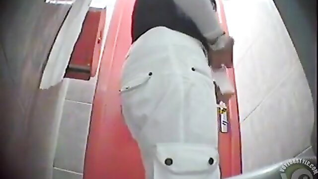 Blonde in tight white pants desperate pee hold in bathroom