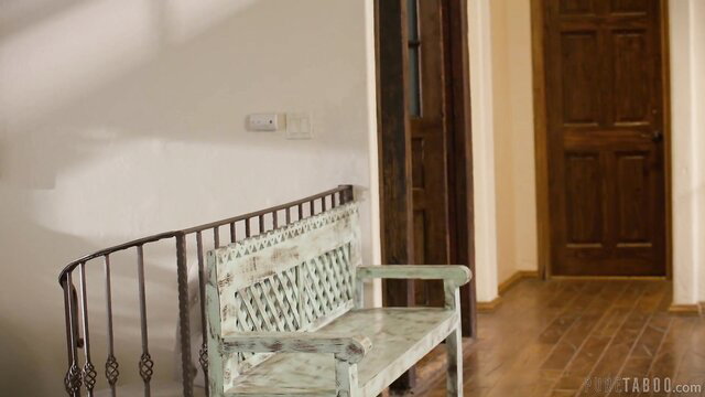Elegant white bench and railing in sunlit Indian home interior