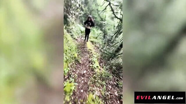 Proxy Paige running nude on trail in EvilAngel forest anal kink preview