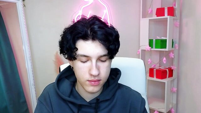 Curly-haired Russian twink in hoodie, eyes closed, JOI humiliation tease