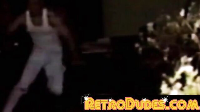 Retro gay 3some in tank tops tonguing pits and sucking cock