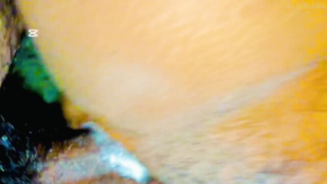 Blurry Sri Lankan stepmom fucking closeup with green skirt and orange glow