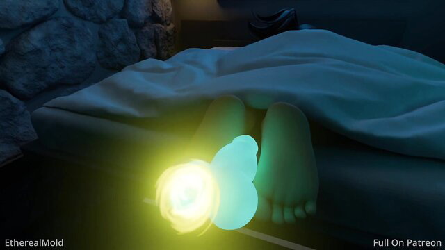 Ethereal glowing dildo penetrates bare foot under sheets in bed