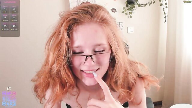 silkencrave sexy redhead cam girl teasing lips closeup