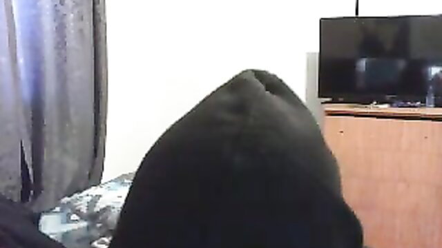 Hooded African camgirl in tight top teases on Stripchat cam2cam