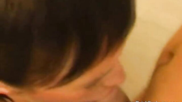 Hot piano tutor closeup on college girl's face during intense lesson