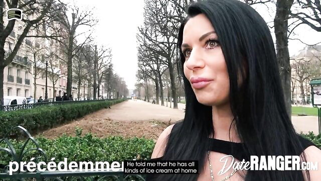 Hot busty brunette poses seductively on Paris street in DateRanger video