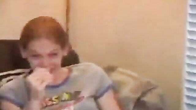 Redhead amateur slut in gray tank top fingers mouth after drinks
