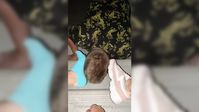 Young Goddess feet worship closeup in colorful socks and sneakers