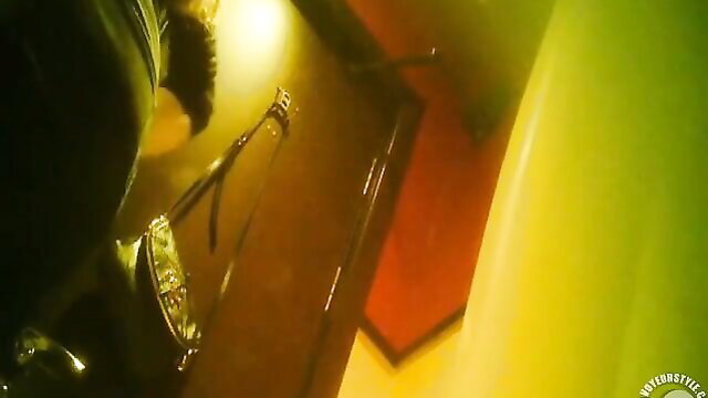 Voyeur spy cam of woman peeing in restaurant toilet