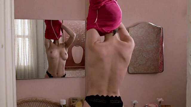 Jamie Lee Curtis topless in panties, back view from Trading Places