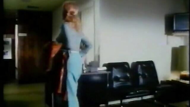 Blonde bombshell in tight jeans and sweater in vintage 1976 porn scene