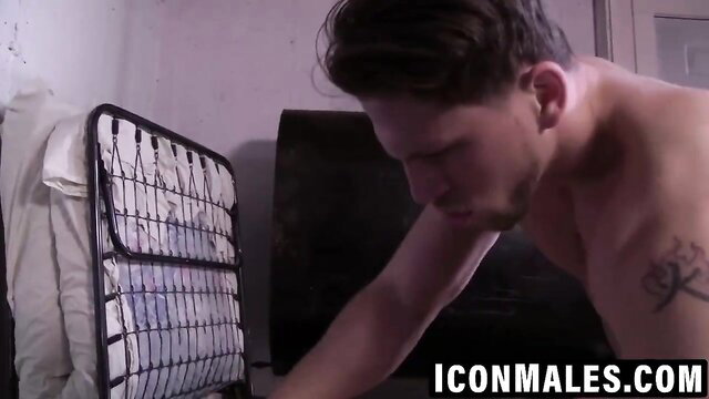 Roman Todd nude closeup, muscular torso and tattooed arm in raw passion