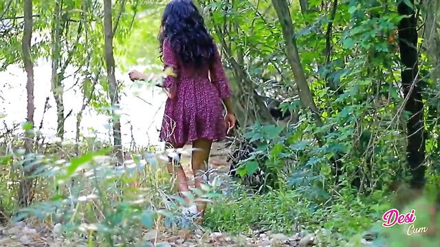 Desi beauty in short purple dress walking in forest, hot ass view