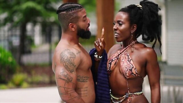 Pha Baby as Quita in sexy snake bikini with muscular black man outdoors