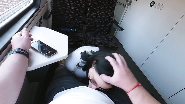 Dada Deville kneels and sucks cock on train POV by Dada Deville