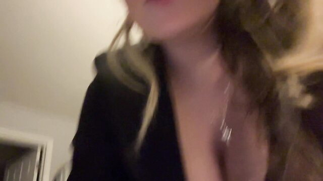 Miss Cassi in black dress with deep cleavage encouraging cum on tits